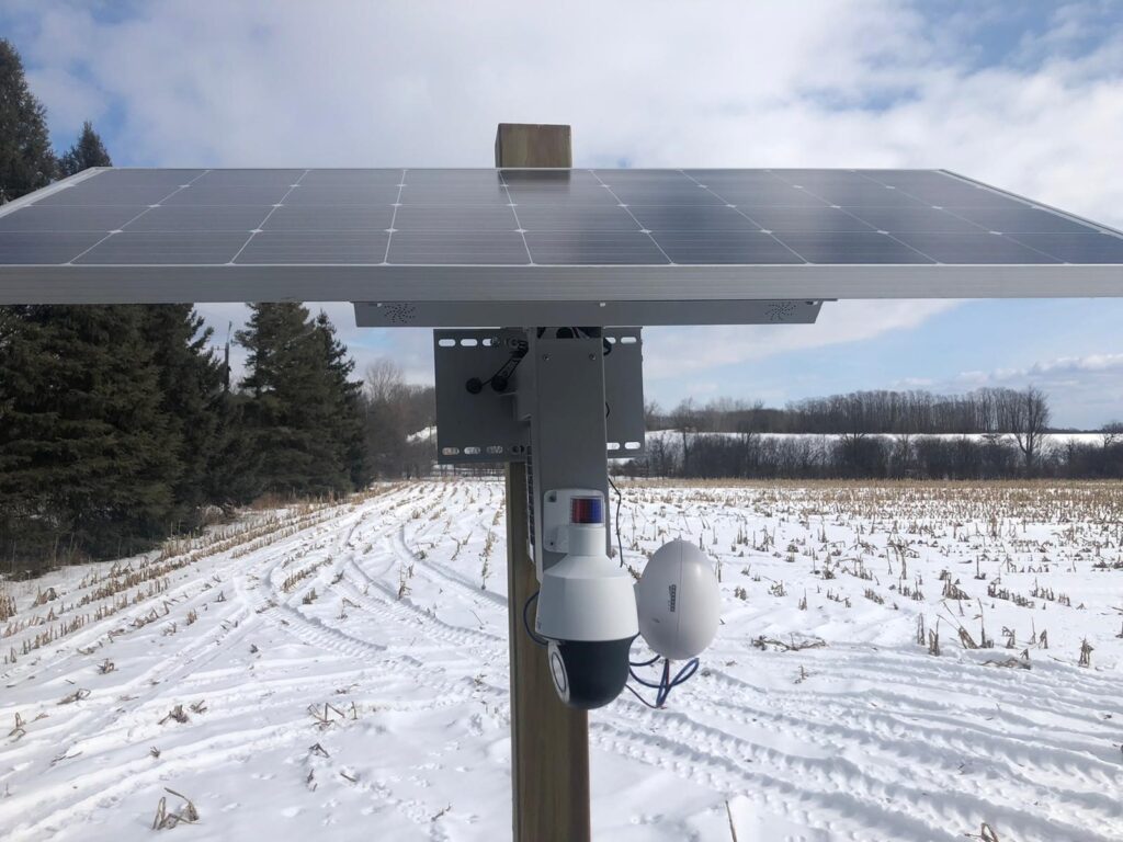 Uniview IPC672 Active Deterrence PTZ installed with a solar panel.