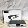 8-port BDCOM PoE switch with retail box on a marble background
