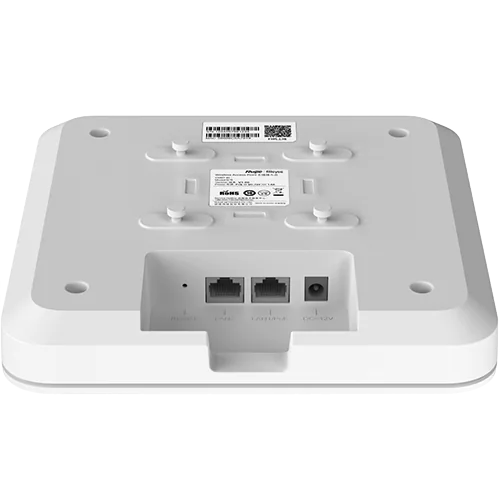 The bottom of a WiFi ceiling-mounted access point with two RJ45 ports for internet and one DC port for power