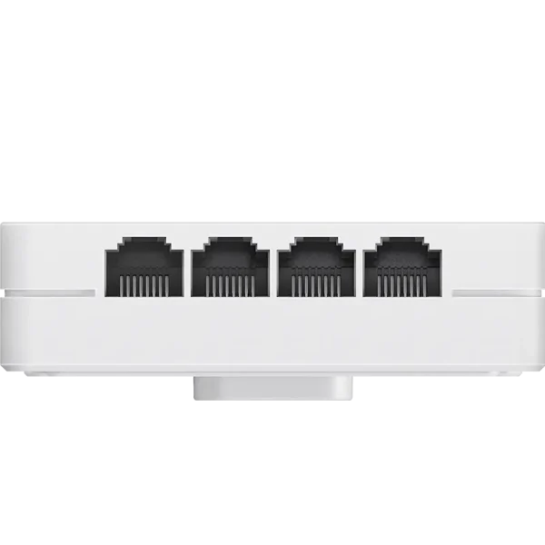 The bottom of wireless access point with four ethernet ports visible